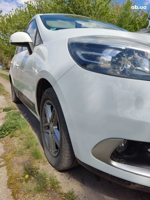 Renault Scenic 2012 - фото 16