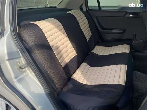 Opel Astra 2008 - фото 23