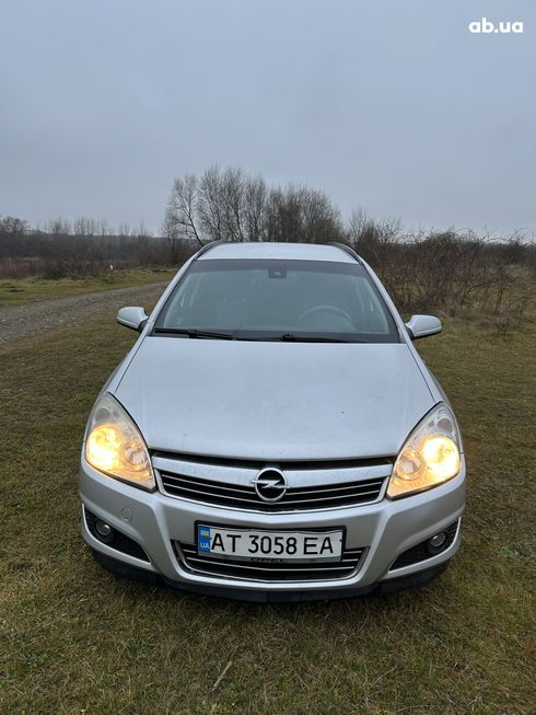 Opel Astra 2008 серебристый - фото 15