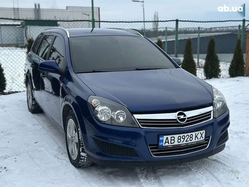 Opel Astra 2010 - фото 7