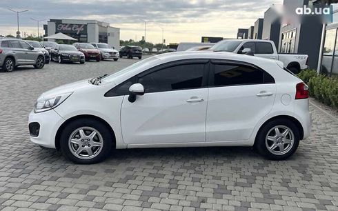 Kia Rio 2013 - фото 4