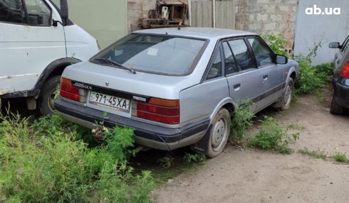 Mazda 626 1987 серый - фото 2