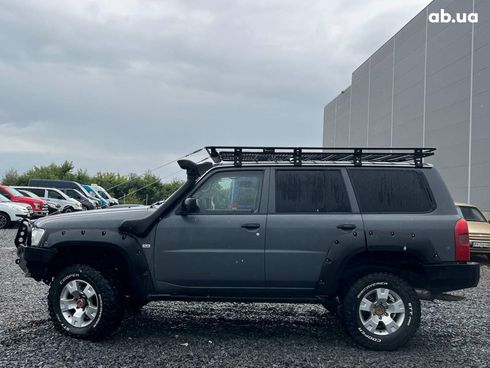 Nissan Patrol 2009 серый - фото 9