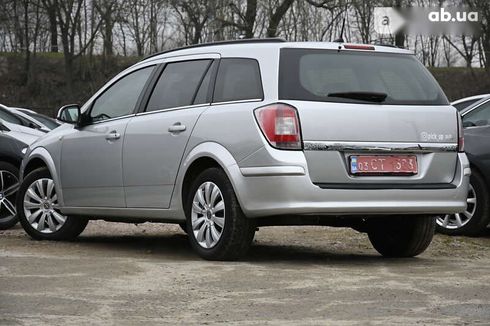 Opel Astra 2010 - фото 10
