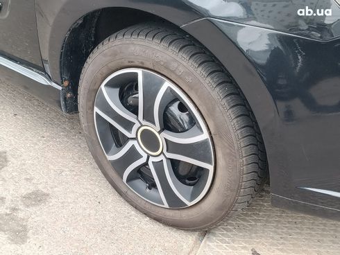 Chevrolet Aveo 2008 черный - фото 6