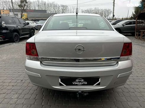 Opel Astra 2008 - фото 11