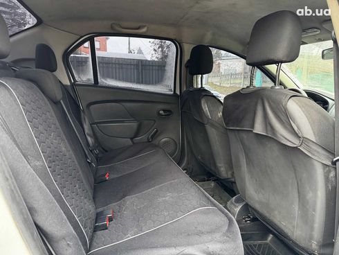 Renault Logan 2015 белый - фото 23